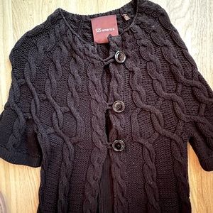 Trendy black cardigan sweater with oversized buttons